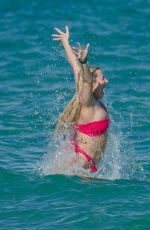 TANA MOGEAU in a Red Bikini at a Beach in Miami 01/12/2023