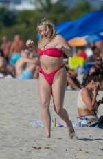 TANA MOGEAU in a Red Bikini at a Beach in Miami 01/12/2023