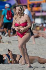 TANA MOGEAU in a Red Bikini at a Beach in Miami 01/12/2023