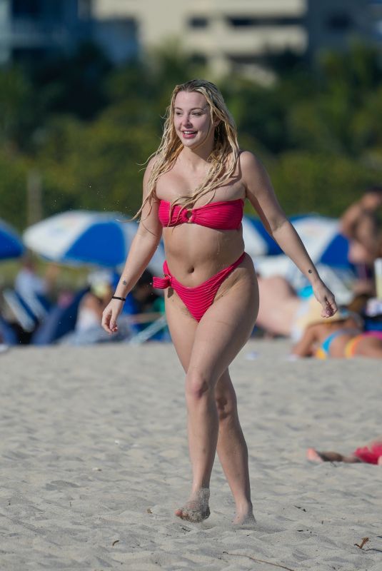 TANA MOGEAU in a Red Bikini at a Beach in Miami 01/12/2023