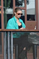 ADDISON RAE Gets Some Work Done on Her Computer in West Hollywood 02/14/2023