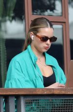 ADDISON RAE Gets Some Work Done on Her Computer in West Hollywood 02/14/2023