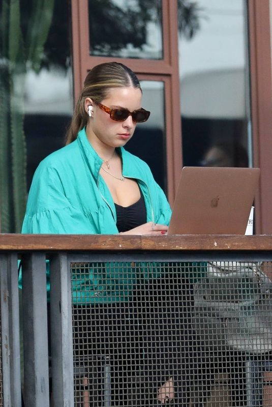 ADDISON RAE Gets Some Work Done on Her Computer in West Hollywood 02/14/2023