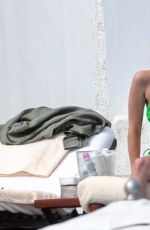ASHLEY BENSON in a Green Bikini in Los Cabos 02/27/2023