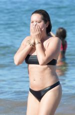 ASHLEY TISDALE in Bikini at a Beach in Maui 02/07/2023