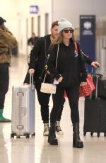 BRIELLE BIERMANN Arrives at LAX Airport in Los Angeles 02/09/2023
