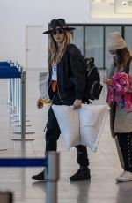 CARA DELEVINGNE and MINKE Arrives at Airport in Cabo San Lucas 02/08/2023
