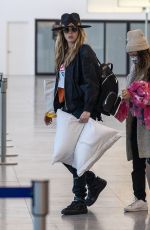 CARA DELEVINGNE and MINKE Arrives at Airport in Cabo San Lucas 02/08/2023