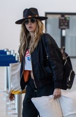 CARA DELEVINGNE and MINKE Arrives at Airport in Cabo San Lucas 02/08/2023