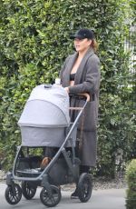 CHRISSY TEIGEN Out with Her 3rd Baby in Los Angeles 01/31/2023