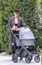 CHRISSY TEIGEN Out with Her 3rd Baby in Los Angeles 01/31/2023