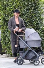 CHRISSY TEIGEN Out with Her 3rd Baby in Los Angeles 01/31/2023