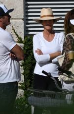 CINDY CRAWFORD and Rande Gerber at a Pool in Miami Beach 02/16/2023