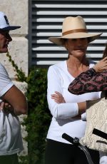 CINDY CRAWFORD and Rande Gerber at a Pool in Miami Beach 02/16/2023