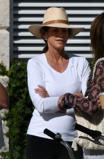 CINDY CRAWFORD and Rande Gerber at a Pool in Miami Beach 02/16/2023