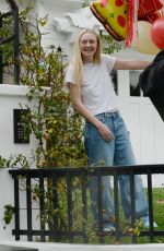 DAKOTA FANNING Receives Loads of Balloons for Her 29th birthday in Los Angeles 02/23/2023