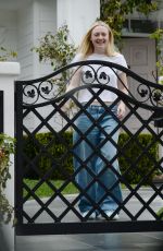 DAKOTA FANNING Receives Loads of Balloons for Her 29th birthday in Los Angeles 02/23/2023
