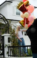 DAKOTA FANNING Receives Loads of Balloons for Her 29th birthday in Los Angeles 02/23/2023