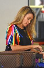 DANNII MINOGUE Leaves Melbourne for Pride Week in Sydney 02/22/2023