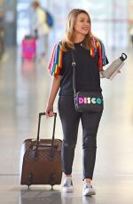 DANNII MINOGUE Leaves Melbourne for Pride Week in Sydney 02/22/2023