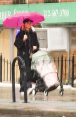 DINAE KRUGER Out with her Baby in New York 02/22/2023