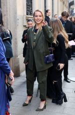 EMMA BROOKS Arrives at Ferrari Fashion Show in Milan 02/25/2023
