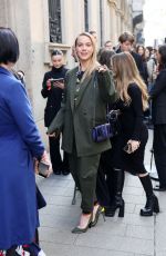 EMMA BROOKS Arrives at Ferrari Fashion Show in Milan 02/25/2023