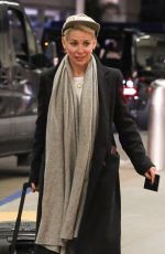 EVANGELINE LILLY at LAX Airport in Los Angeles 02/08/2023
