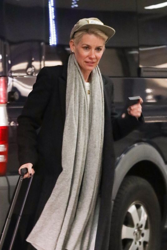 EVANGELINE LILLY at LAX Airport in Los Angeles 02/08/2023
