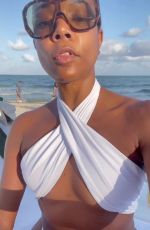 GABRIELLE UNION in a White Bikini at a Beach 12/04/2022
