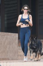 GISELE BUNDCHEN Out Jogging with Her Dog in Miami 02/08/2023