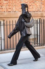 IRINA SHAYK in a Oversized Leather Jacket Out in New York 02/15/2023