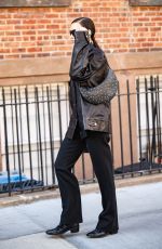 IRINA SHAYK in a Oversized Leather Jacket Out in New York 02/15/2023