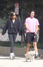 KAIA GERBER Out Walk in a Park with a Friend and Her Dog in Los Angeles 02/08/2023