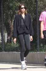 KAIA GERBER Out Walk in a Park with a Friend and Her Dog in Los Angeles 02/08/2023