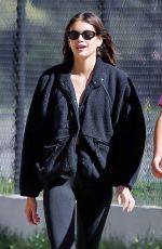 KAIA GERBER Out Walk in a Park with a Friend and Her Dog in Los Angeles 02/08/2023