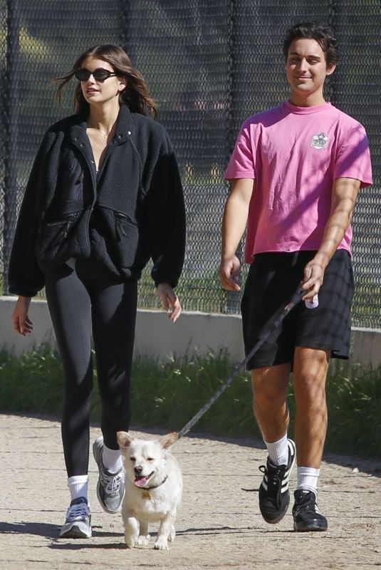 KAIA GERBER Out Walk in a Park with a Friend and Her Dog in Los Angeles 02/08/2023