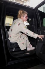 KATHRYN NEWTON Signs for Fans in Her Pajamas at LAX in Los Angeles 02/17/2023