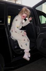 KATHRYN NEWTON Signs for Fans in Her Pajamas at LAX in Los Angeles 02/17/2023