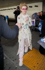 KATHRYN NEWTON Signs for Fans in Her Pajamas at LAX in Los Angeles 02/17/2023