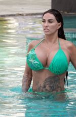 KATIE PRICE in a Green Bikini at a Pool in Thailand 02/22/2023