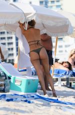 KIMBERLEY GARNER in Bikini on the Beach in Miami 02/26/2023