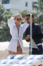 KIMBERLEY GARNER Out at a Beach in Miami 02/26/2023