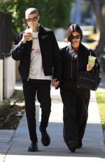 KOURTNEY KARDASHIAN and Travis Barker Out in West Hollywood 02/20/2023