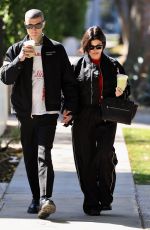 KOURTNEY KARDASHIAN and Travis Barker Out in West Hollywood 02/20/2023