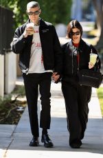 KOURTNEY KARDASHIAN and Travis Barker Out in West Hollywood 02/20/2023