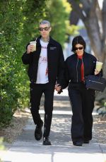 KOURTNEY KARDASHIAN and Travis Barker Out in West Hollywood 02/20/2023