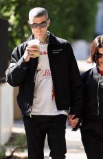KOURTNEY KARDASHIAN and Travis Barker Out in West Hollywood 02/20/2023