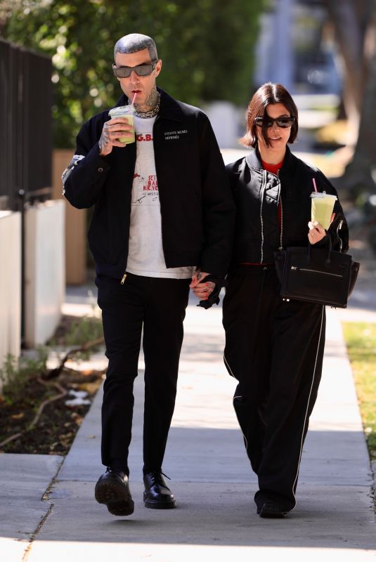 KOURTNEY KARDASHIAN and Travis Barker Out in West Hollywood 02/20/2023