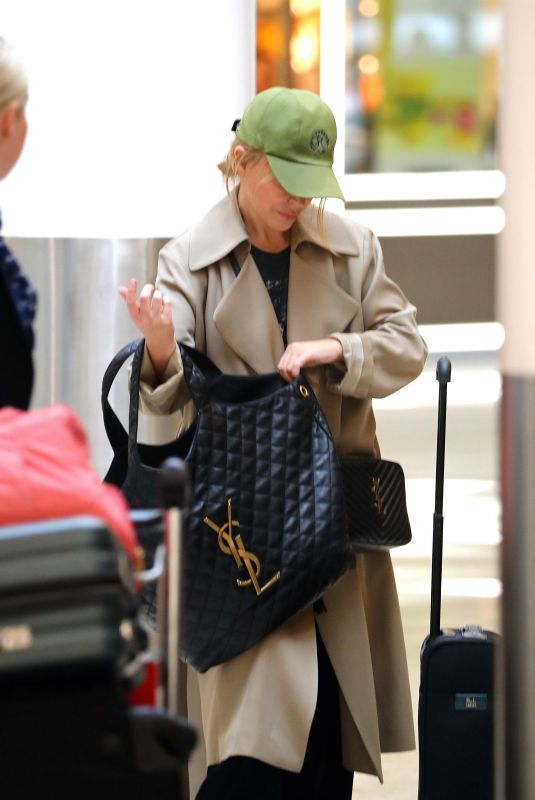KYLIE MINOGUE Arrives at Sydney International Airport 02/13/2023